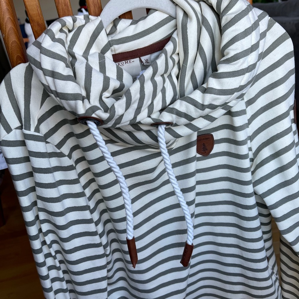 XL Wanakome asymmetrical hooded sweatshirt in Oatmeal with khaki green stripes.